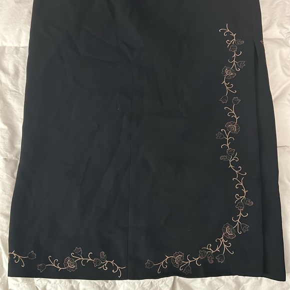 Black Maxi Skirt with Thigh Slit on side. Comes with Embroidered Flower Design. - Picture 3 of 4